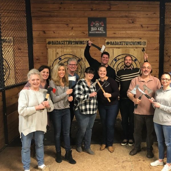 WebCE content team at an axe throwing event